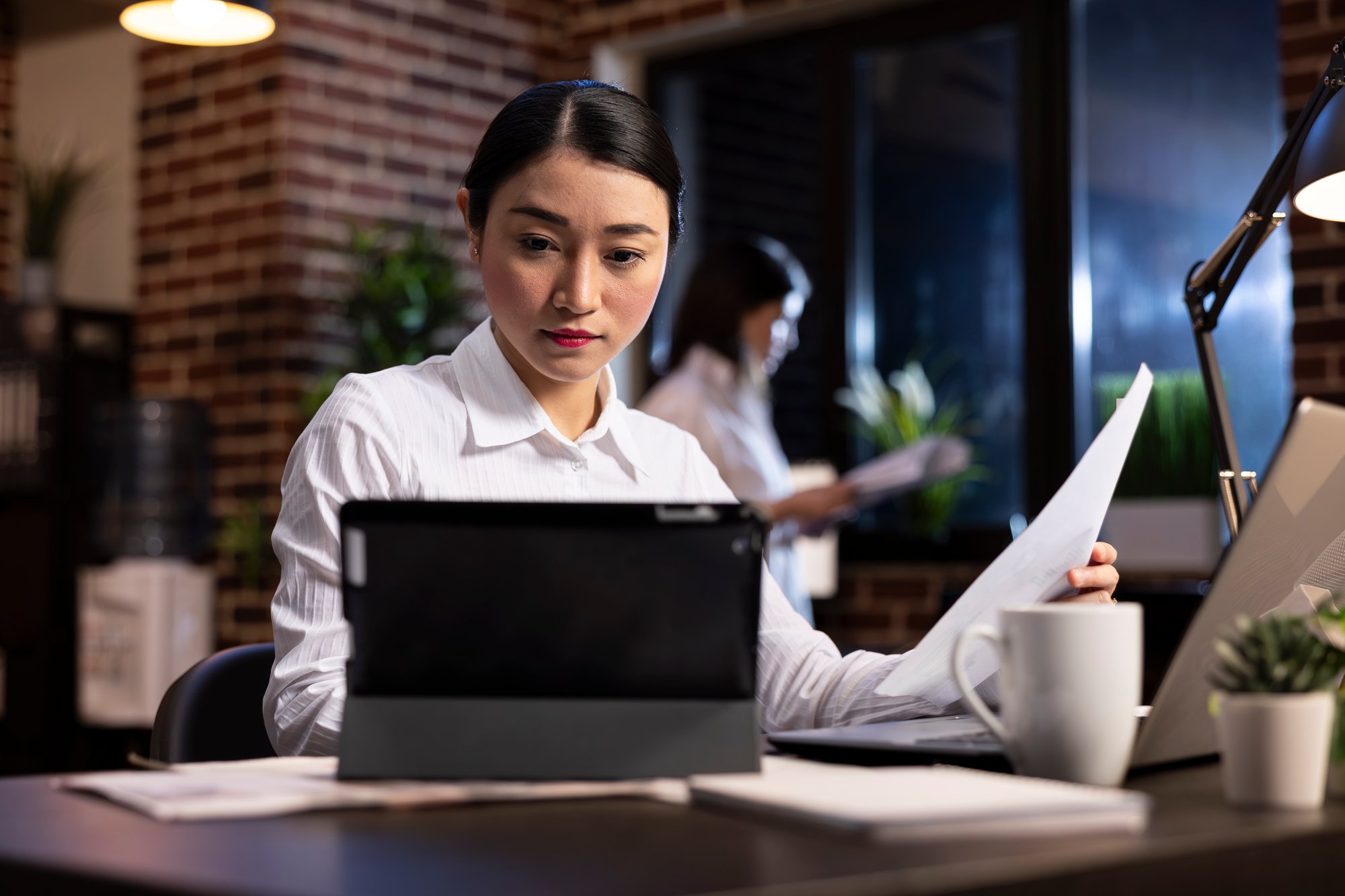 female-manager-reviews-business-reports